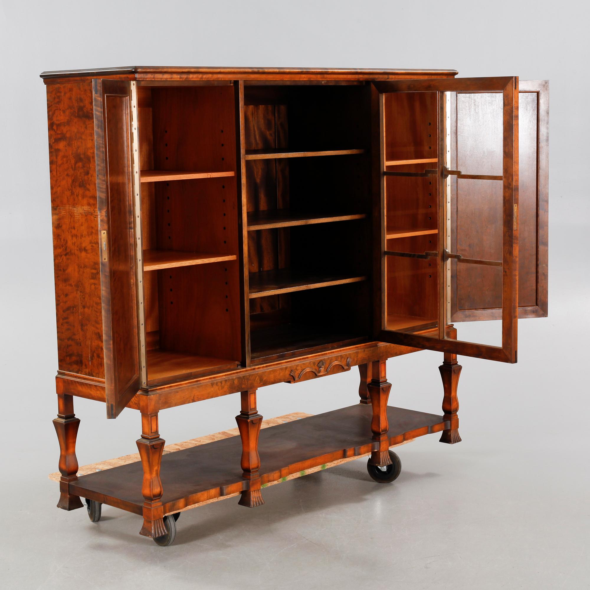 A 1920/30s swedish grace cupboard, model "Sture", made by AB Seffle Möbelfabrik.