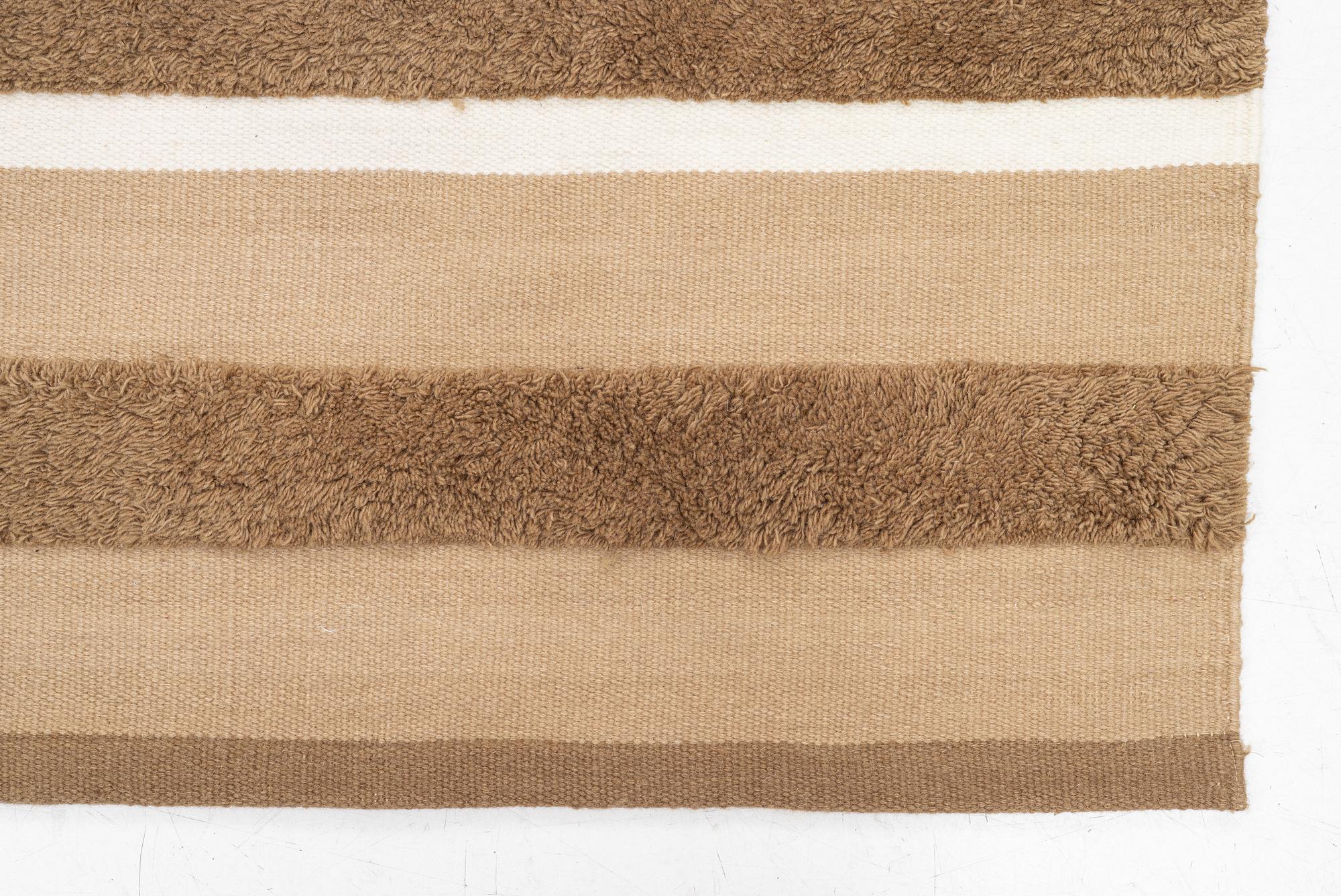 A partially tufted 'Veda' carpet, Chaatwal & Jonsson, approx. 300 x 205 cm.