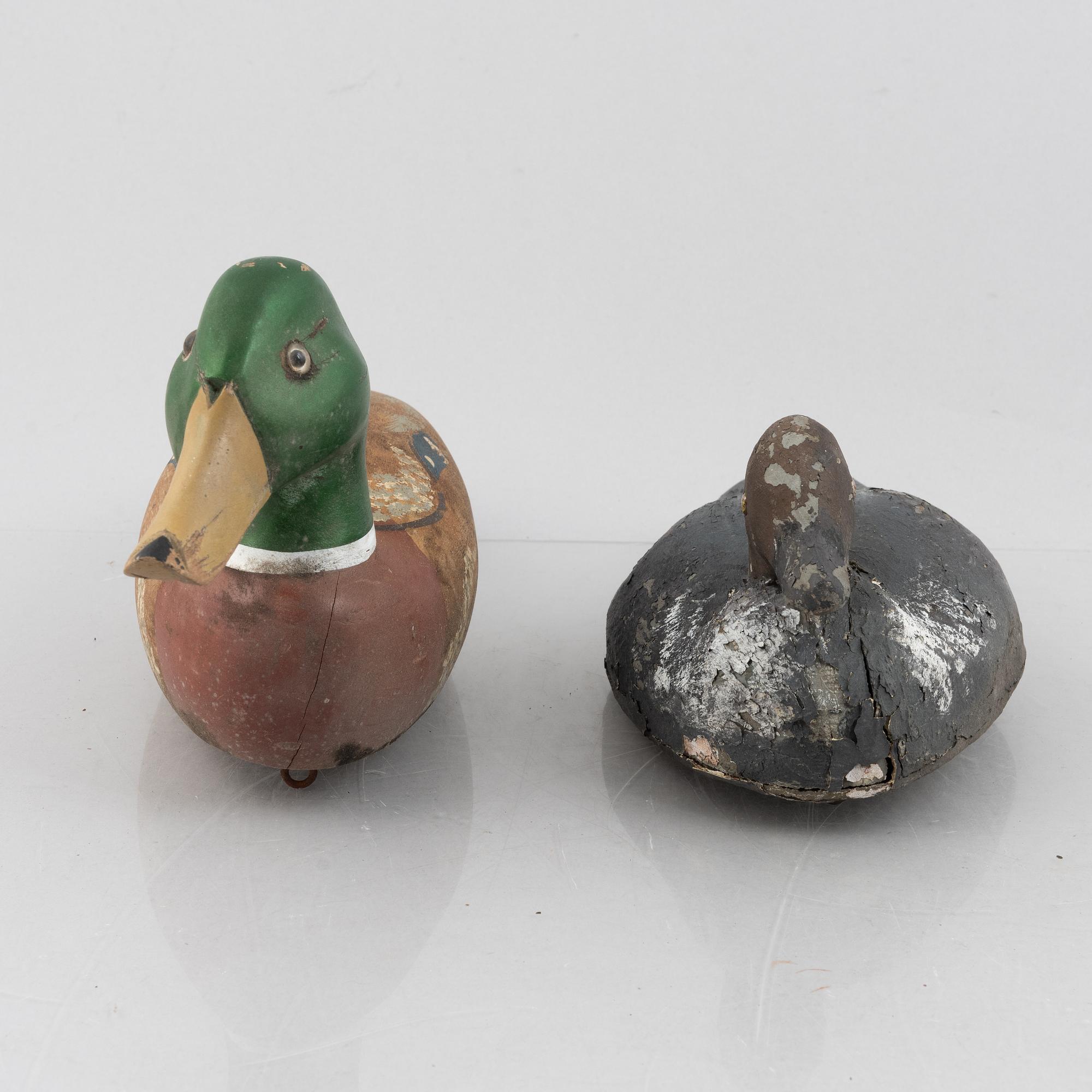 A set of six wooden duck decoys, 20th century.