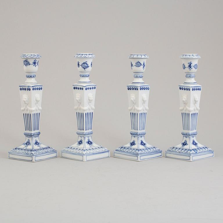 Two pairs of porcelain candlesticks by Royal Copenhagen, Denmark, third quarter of the 20th century.