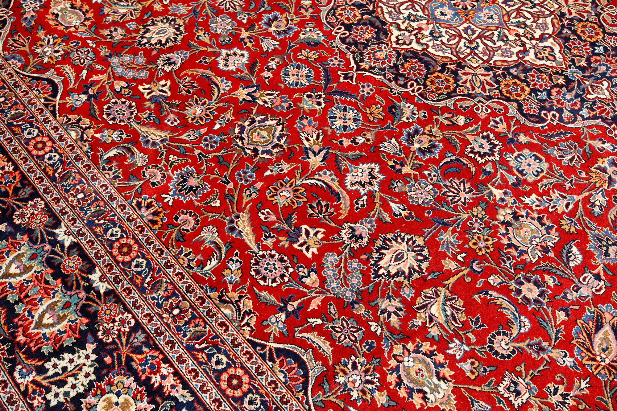 Carpet, Keshan, semi-antique, signed, 439 x 316 cm.