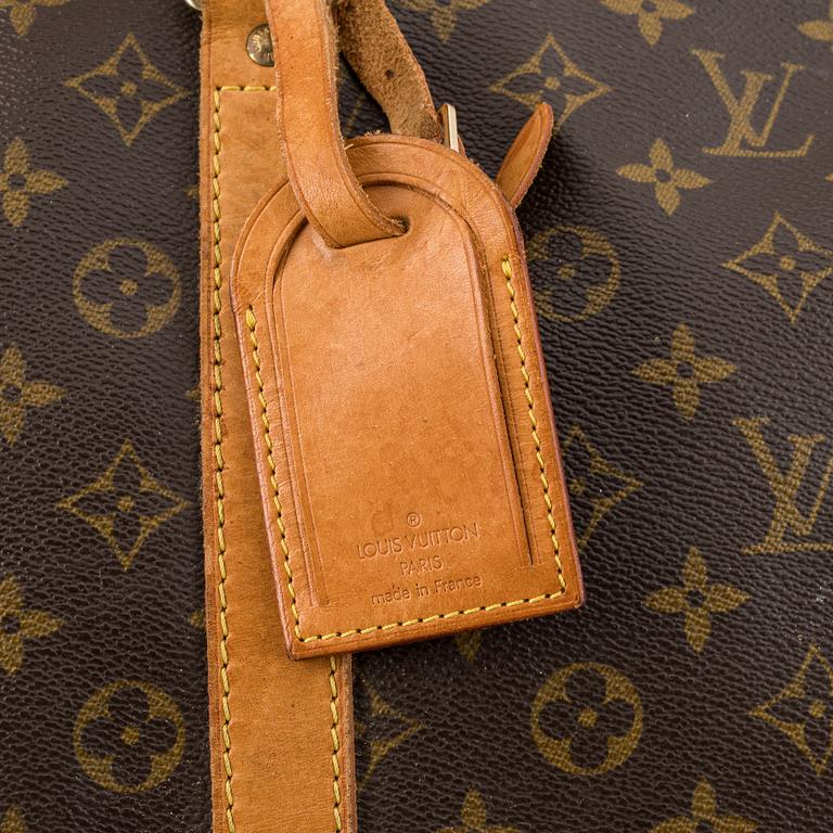 Louis Vuitton, a monogram canvas 'Keepall 55' weekend bag and toilet bag.