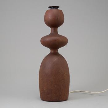 A 1960s teak table lamp.