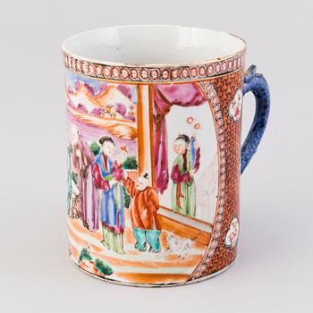 An early 19th century Chinese porcelain mug.