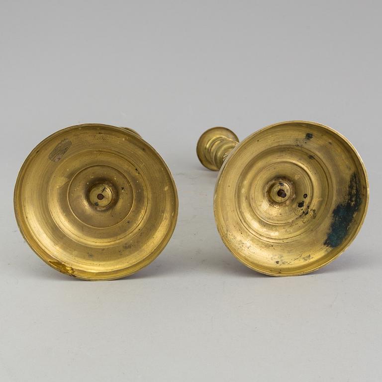 A pair of 'Empire' candlesticks, probably French.