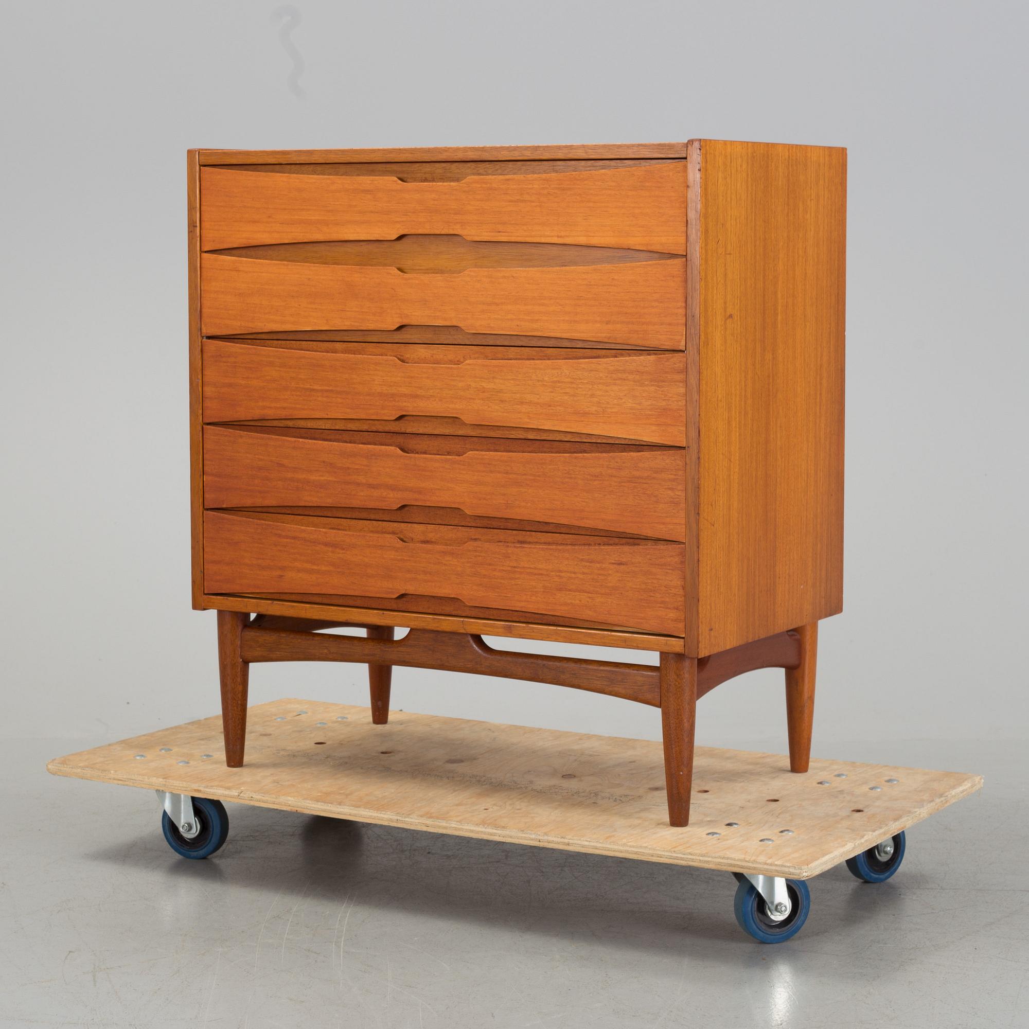 A mid 20th century teak dressing commode.