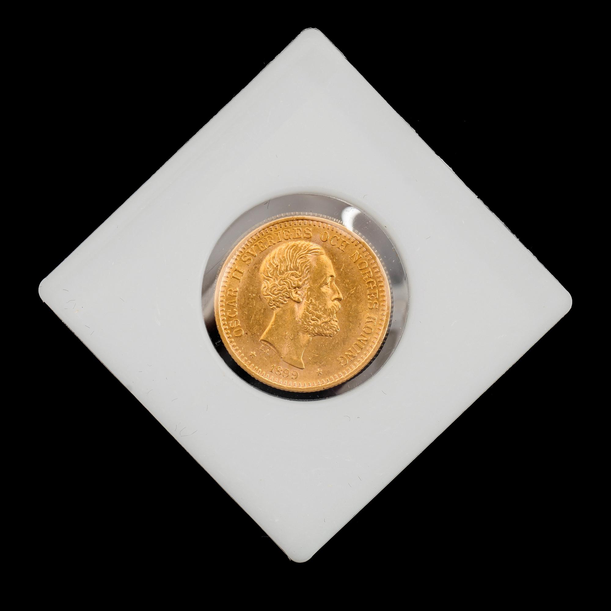 GULDMYNT, 20 kronor, Oscar II, 1899. Vikt ca 9 gram.