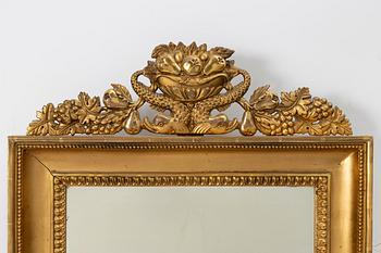 A pair of Empire giltwood two-branch girandole mirrors, Sweden, first part 19th century.
