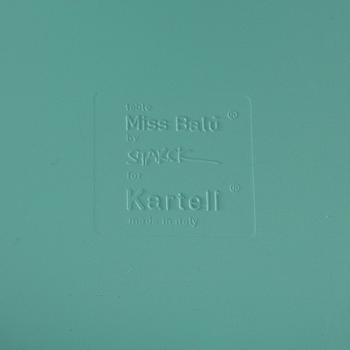 PHILIPPE STARCK, a "Miss Balù" table and a pair of "Dr Glob" chairs, Kartell.