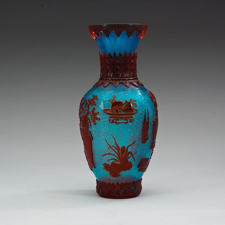 A Chinese red, blue and gold splashed Peking glass vase, 20th Century.