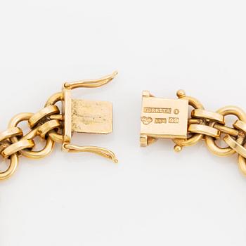 Claës E. Giertta, armband 18K guld med berlock med citrin.