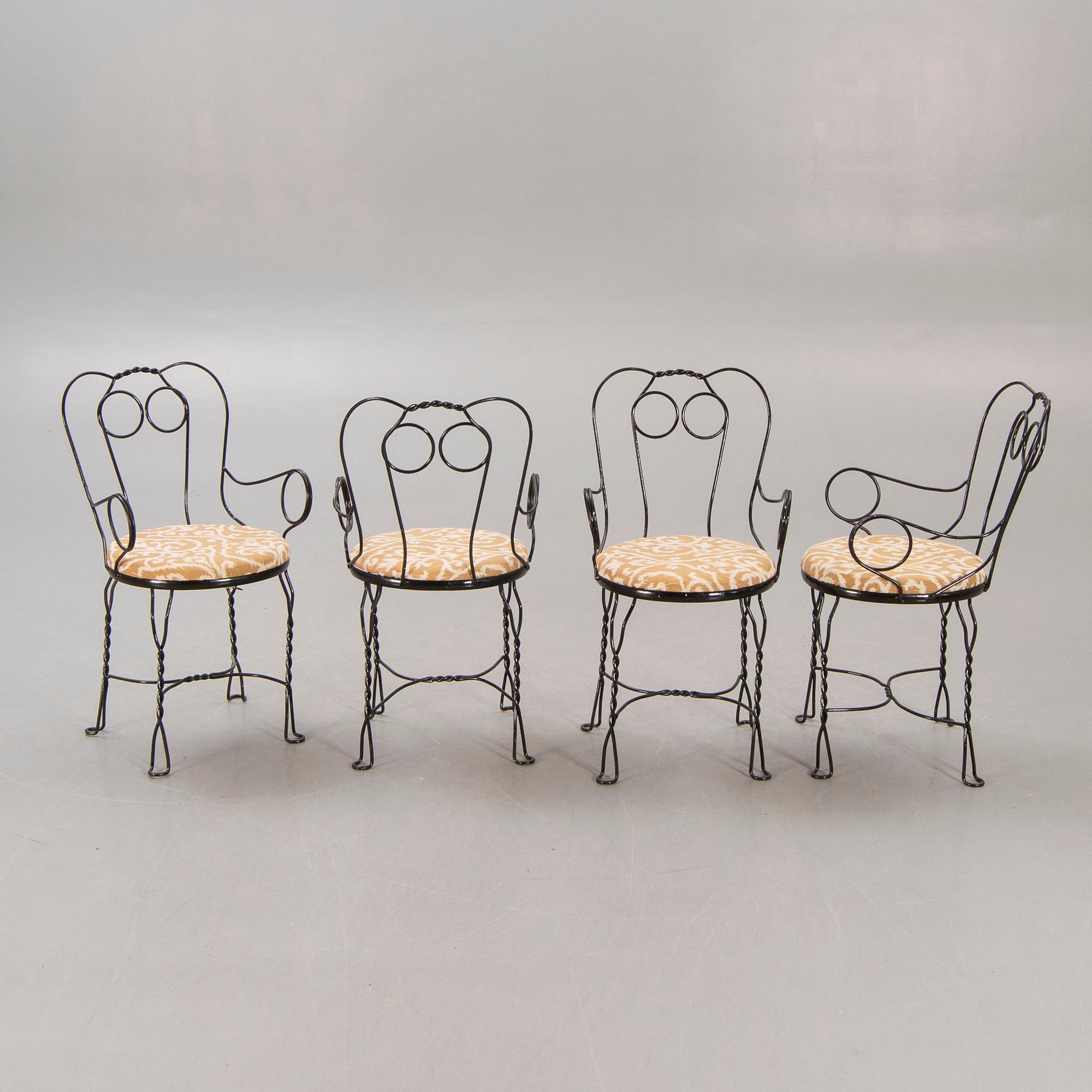 A set of four Grytgöl metal garden chairs mid 1900s.