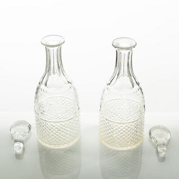 Two glass decanters, around the year 1900.