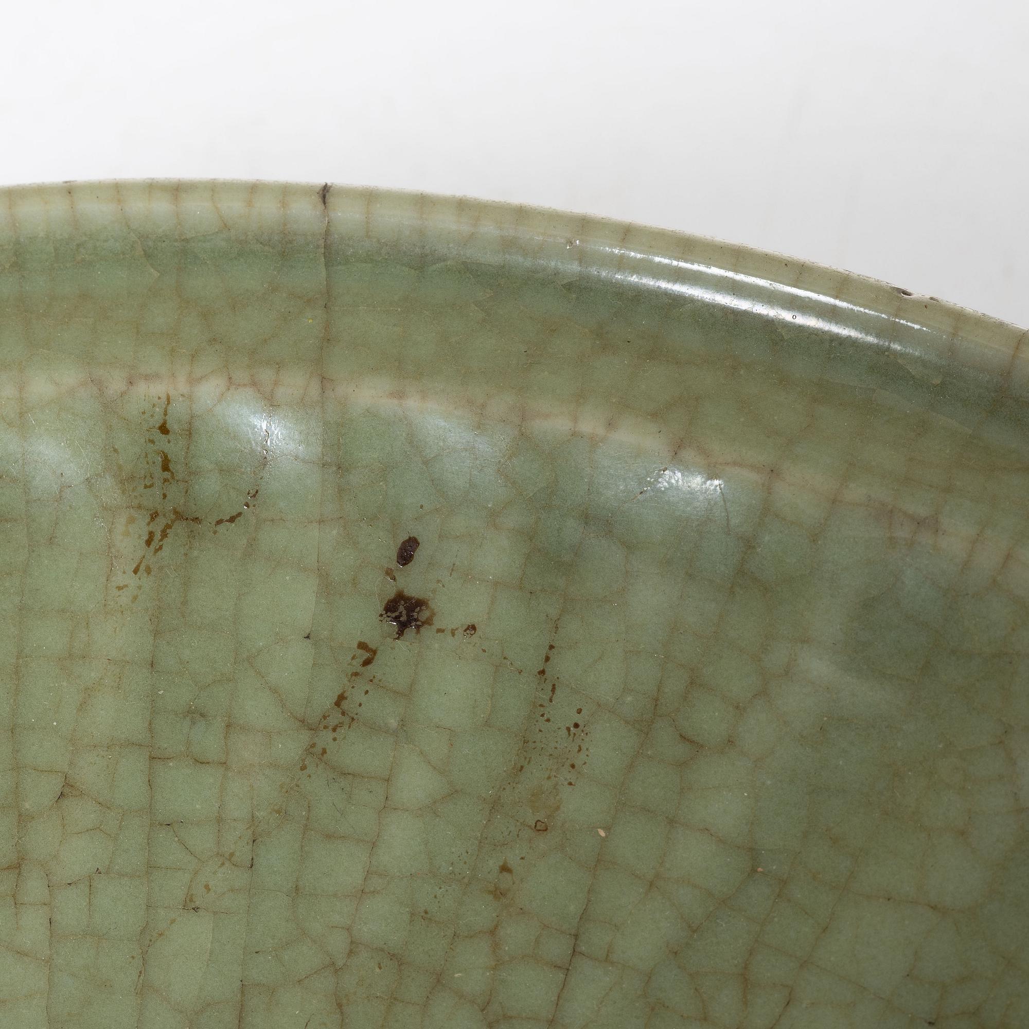 A large celadon glazed dish, Ming dynasty (1368-1644).