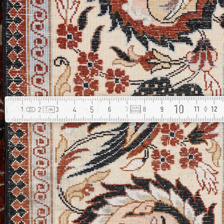 A Keysari figural silk rug, c. 121 x 76 cm.