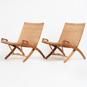 Hans J. Wegner, a pair oak and rattan "model 512" folding chairs by Johannes Hansen, Denmark 1950-60's.