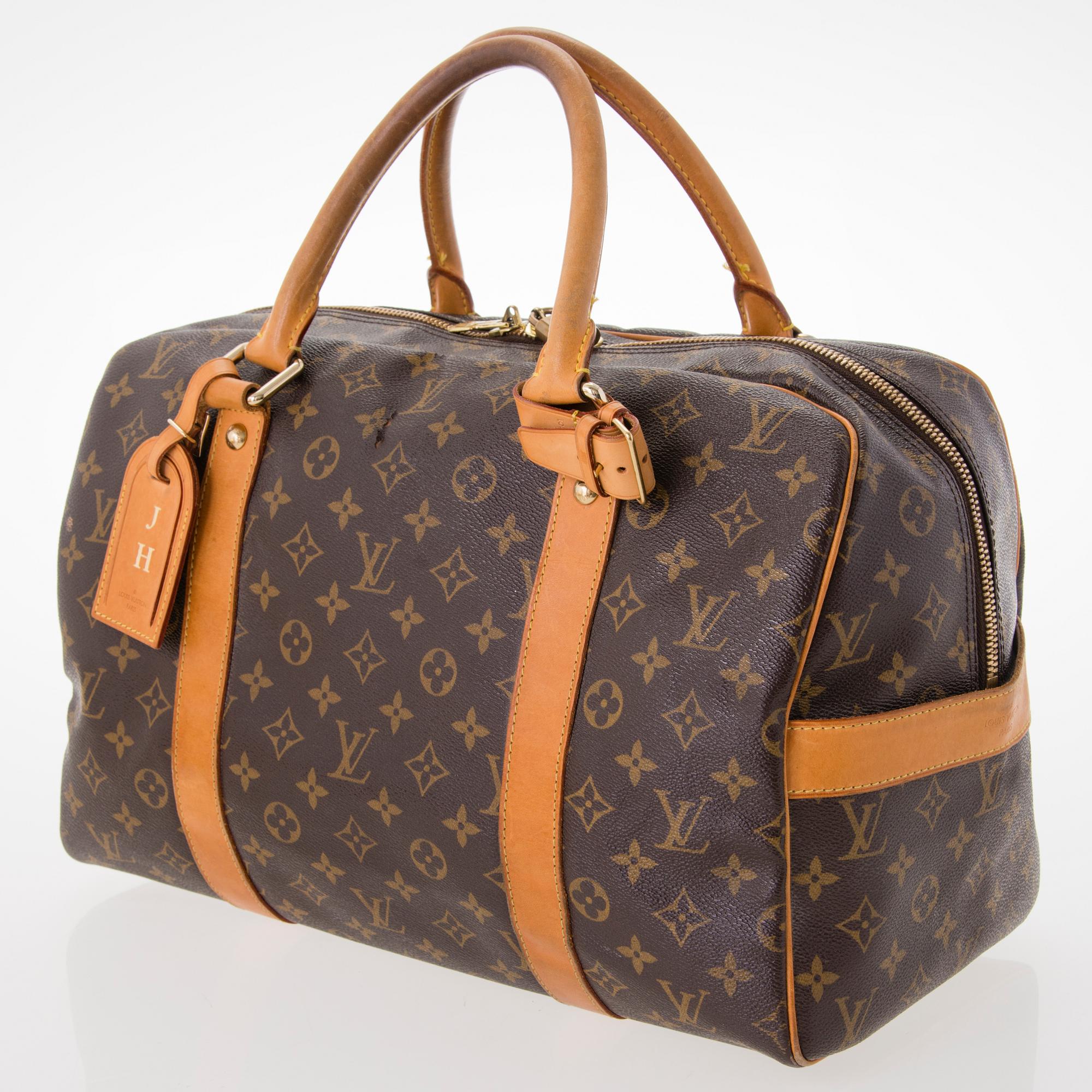 LOUIS VUITTON Monogram Carryall Bag.