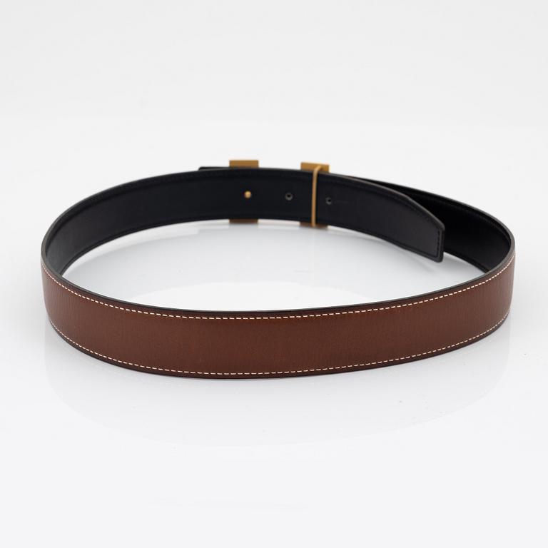 Hermès, A reversible leather and gold hardware 'Constance' belt from 2001.