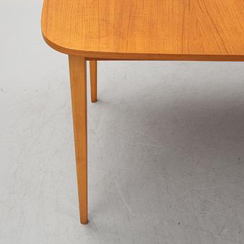 a 1950's/60's teak dining table.