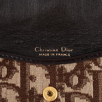 Christian Dior, a clutch, coin purse, key holder and silk scarf.