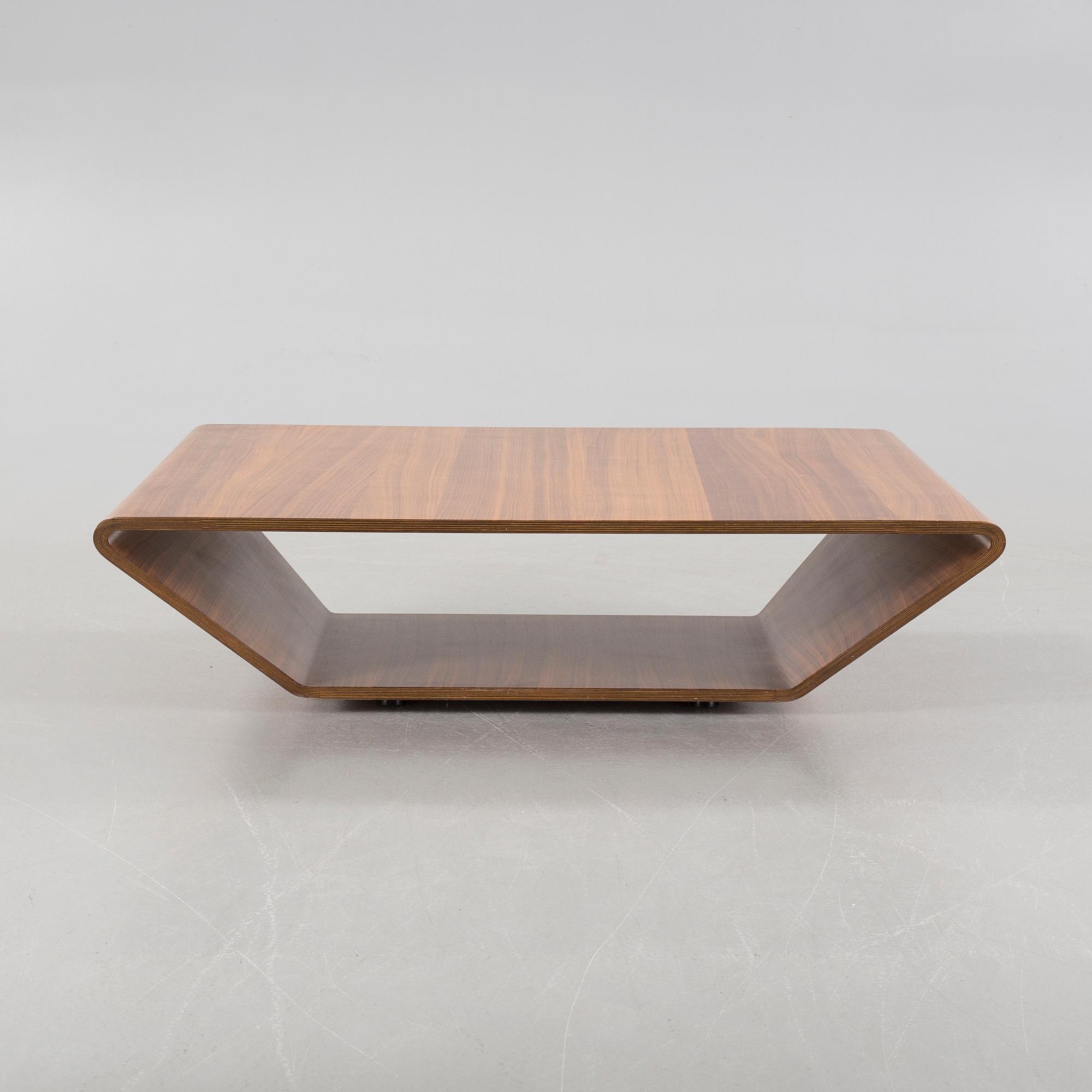 A sofa table by Eero Koivisto and Ola Rune called "Brasilia" from around year 2000 for Swedese.