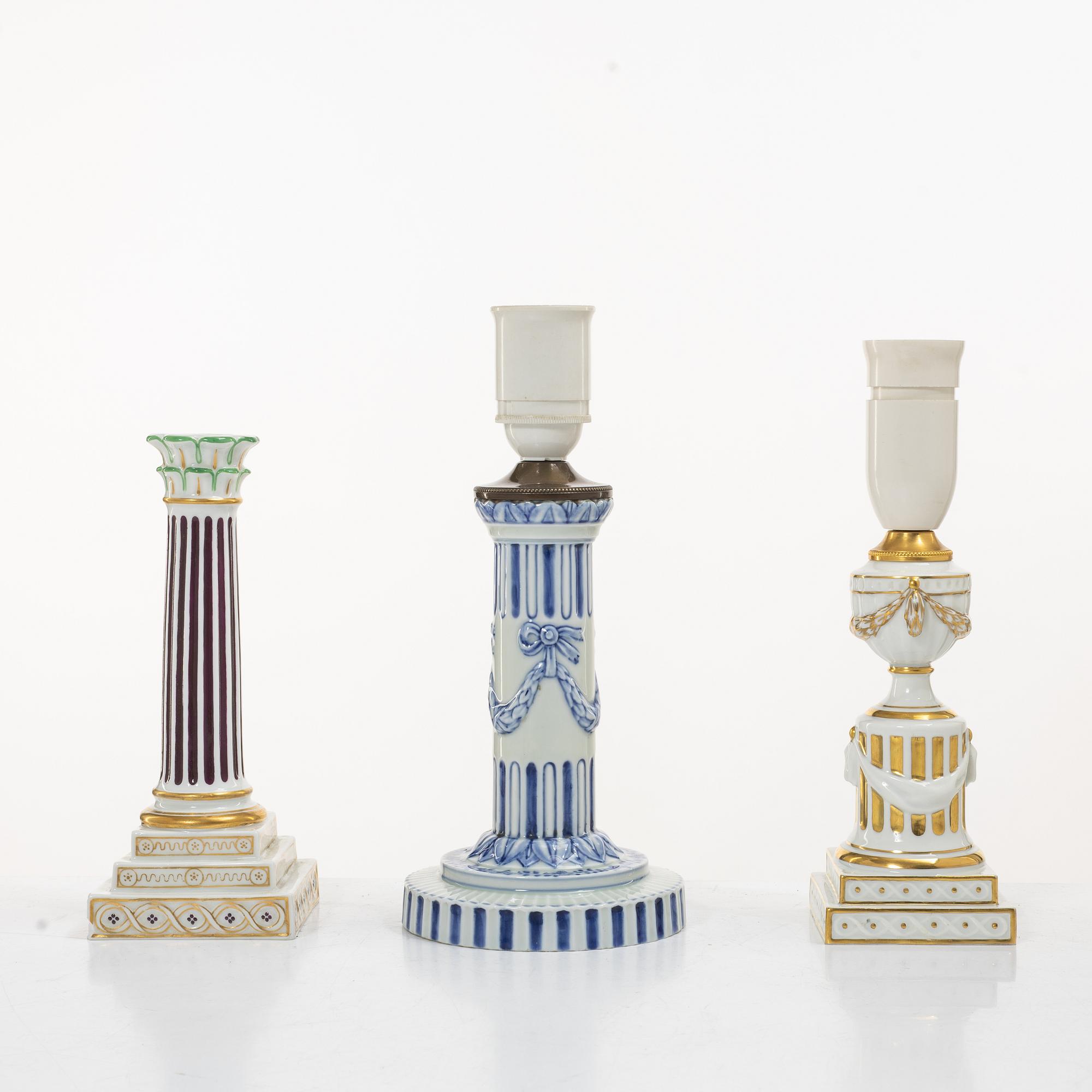 Royal Copenhagen, Two table lamps and a candlestick, Denmark, late 19th–early 20th century.