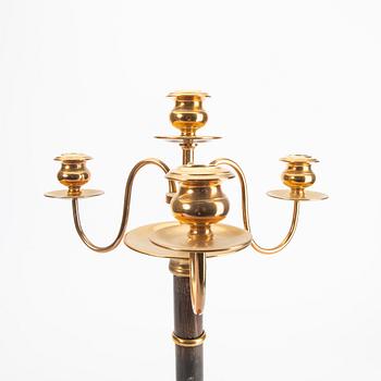 A pair of brass and wood candelabras early 1900s.