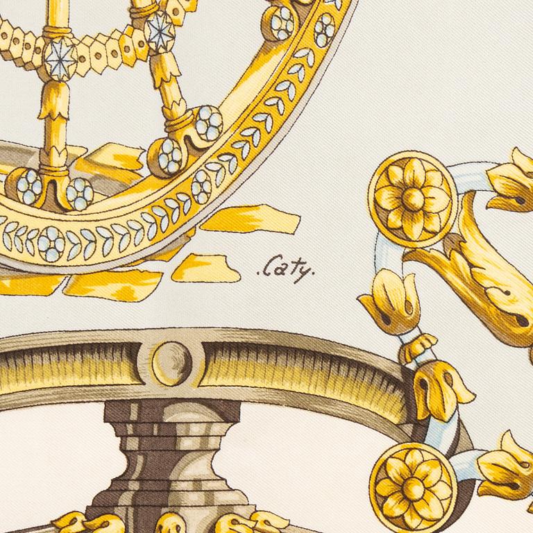 Hermès, a 'Roues de Canon' silk scarf.
