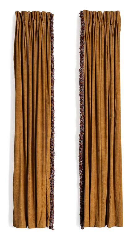 A pair of yellow velvet curtains from Brochier Como.