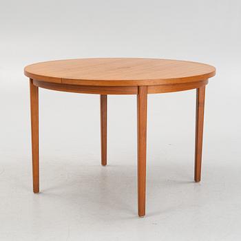 A dining table, mid 20th Century.