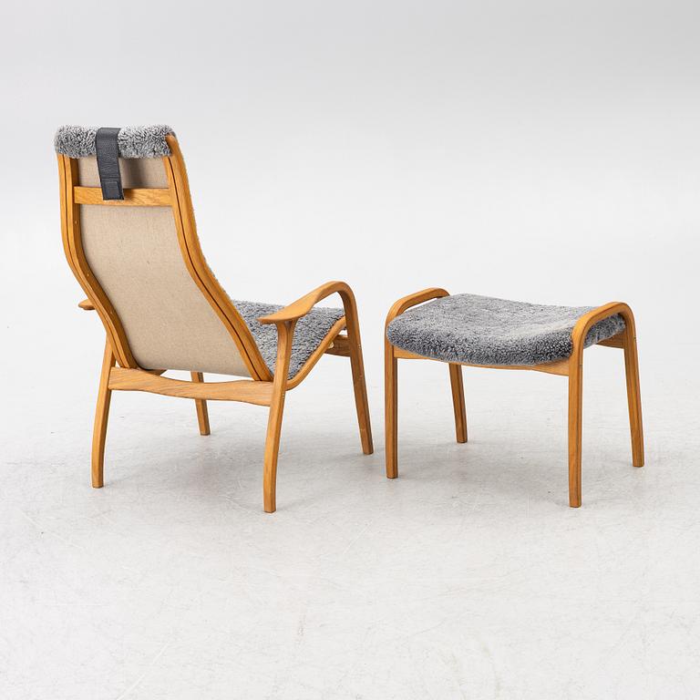 Yngve Ekström, a 'Lamino' armchair with ottoman, Swedese, Sweden, 2018.