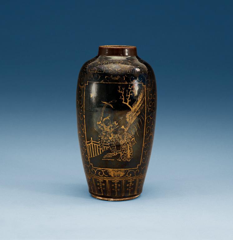 A gilt black vase, Qing dynasty, 18th Century, with Kangxis six character mark.