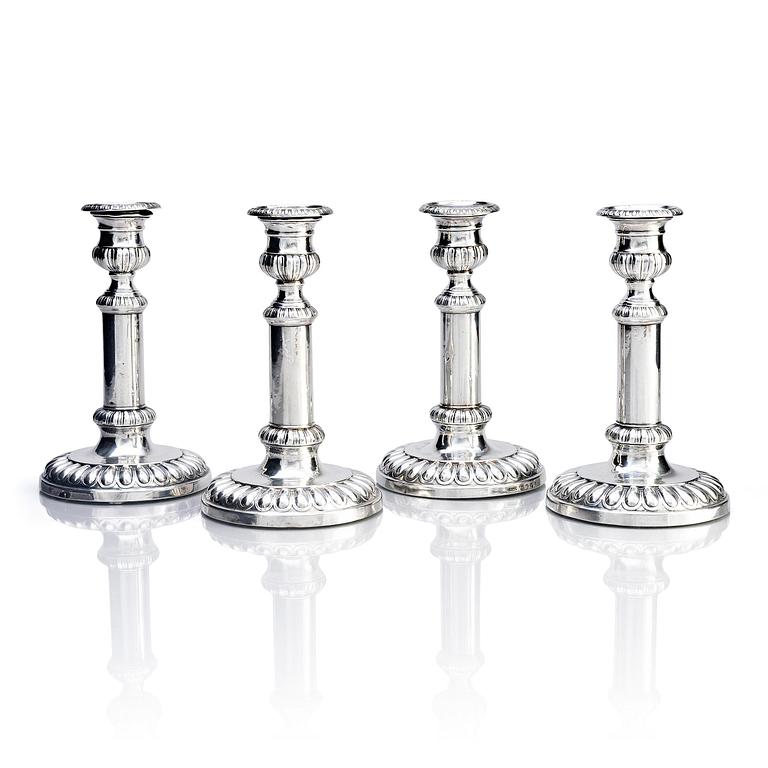Four English silver candlesticks, marks of John Roberts & Co, Sheffield 1808.