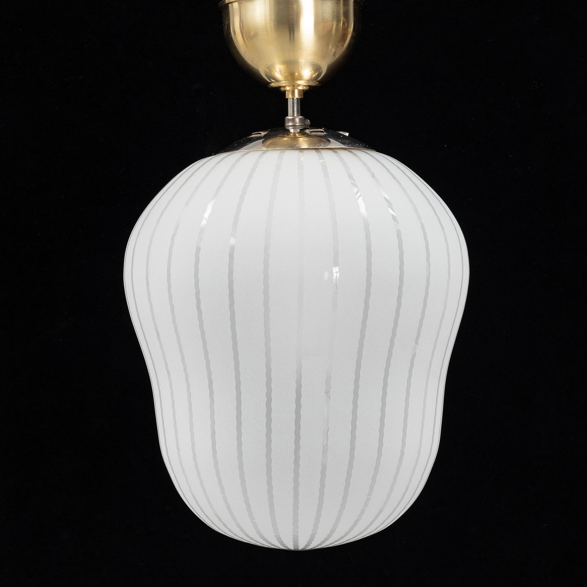 A Swedish Modern glass and brass ceiling light, Orrefors, 1940's.