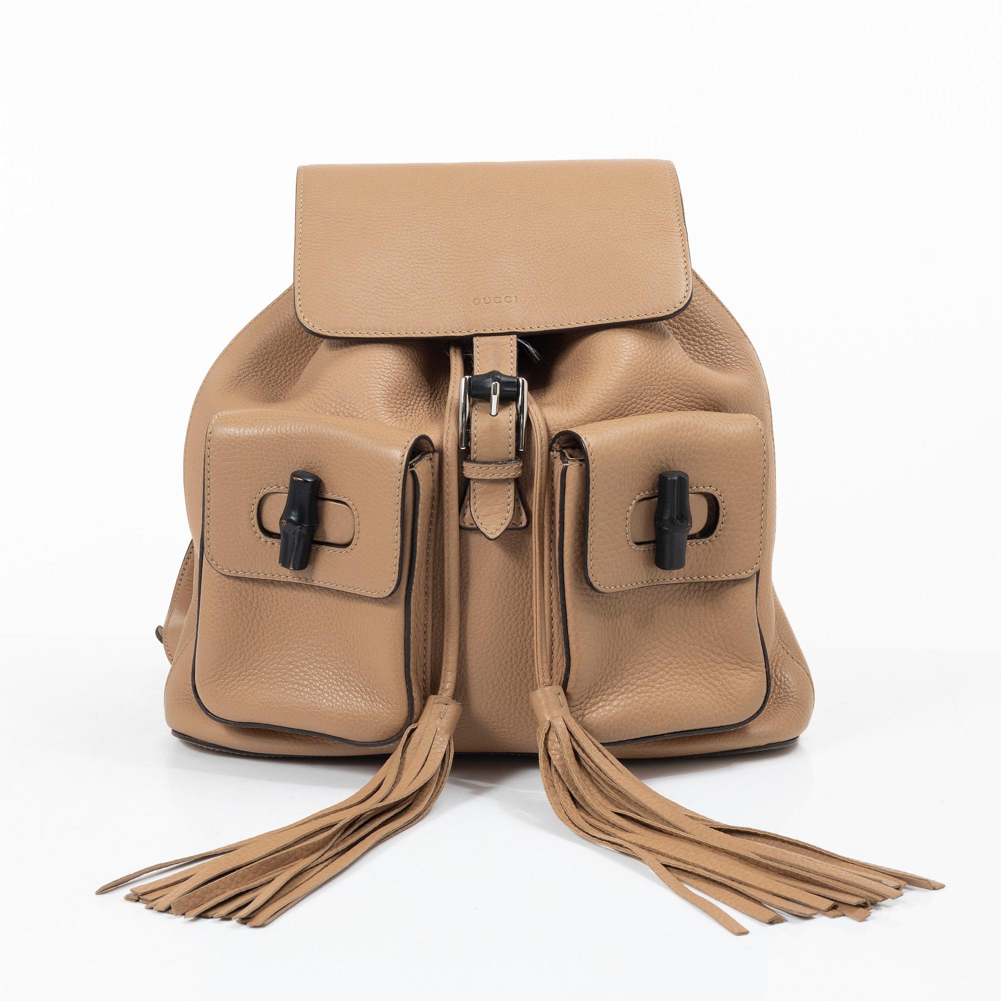 Gucci, a backpack.