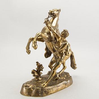 A bronze sculpture after Guillaume Coustau.