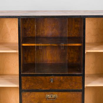 A 1930s functionalist style cabinet.