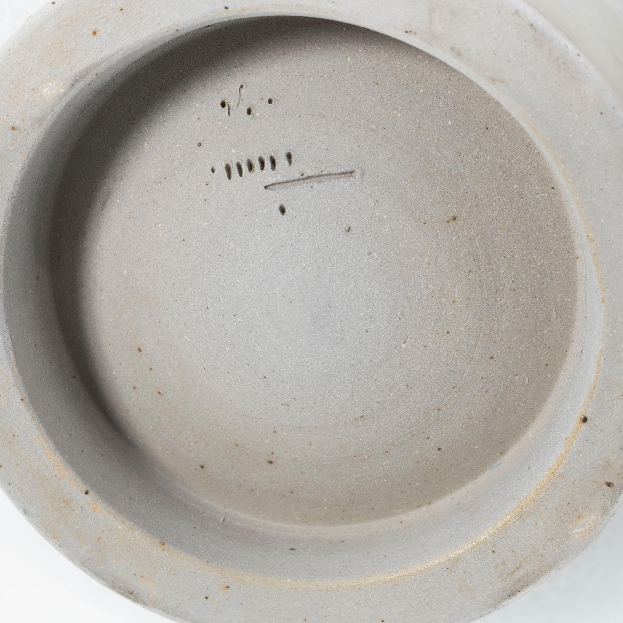 Claes Thell, three stoneware pieces, as well as a piece by Börje Skohg.