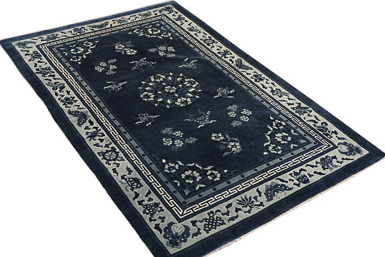 A carpet, China, Antique Finish, ca 250 x 152 cm.
