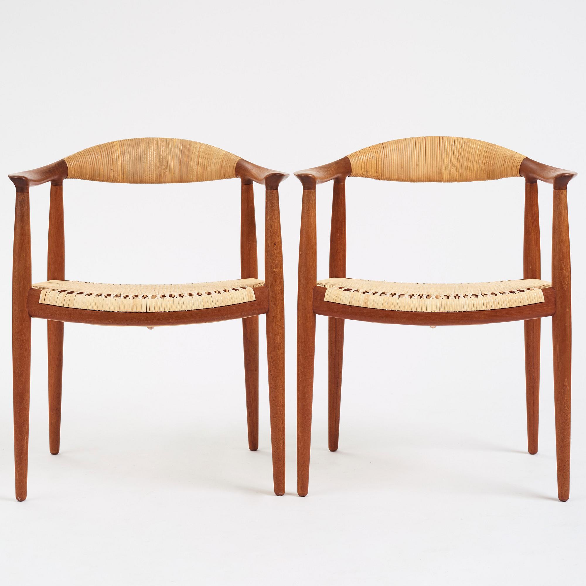 Hans J. Wegner, a pair of teak and rattan 'The Chair', JH-503, Johannes Hansen, Denmark 1950s.