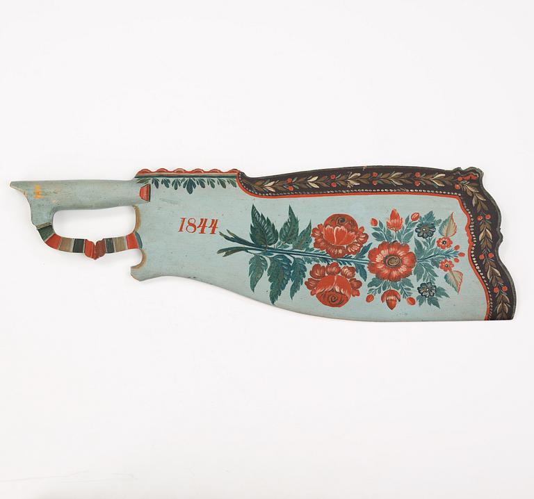 A painted traditional folk art flax knife, attributed to Per Schenler, Norrala, Hälsingland. Dated 1844.