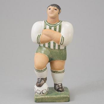 A figurine by Lisa Larson for Gustavsberg.