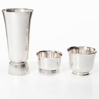 A silver vase and two bowls, Jacob Ängman, Eric Löfman, and Borgila respectively.