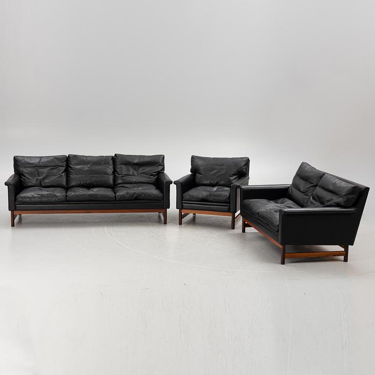 Two leather upholstered sofas and an armchair, IKEA, Sweden, 1960's/70's.