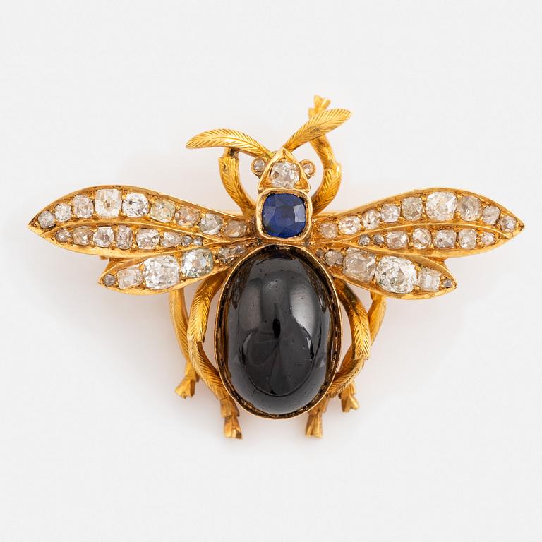 Cabochon cut carbuncle garnet, blue sapphire, old cut and rose cut diamond brooch, 1800's.