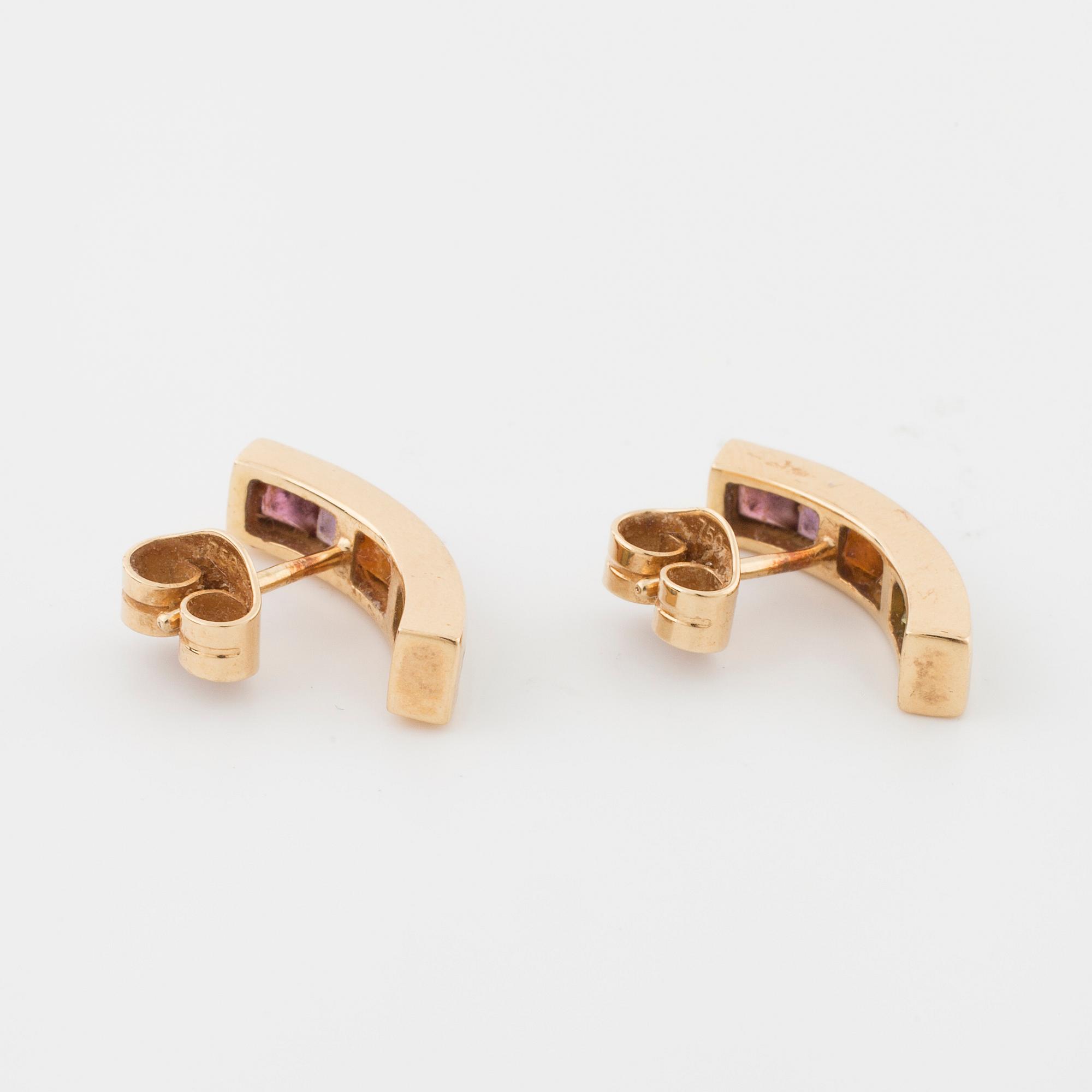 A multicolored gemstone pendant and a pair of earrings, "Collection Rainbow” by H. Stern.