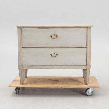 A chest of drawers, circa 1900.