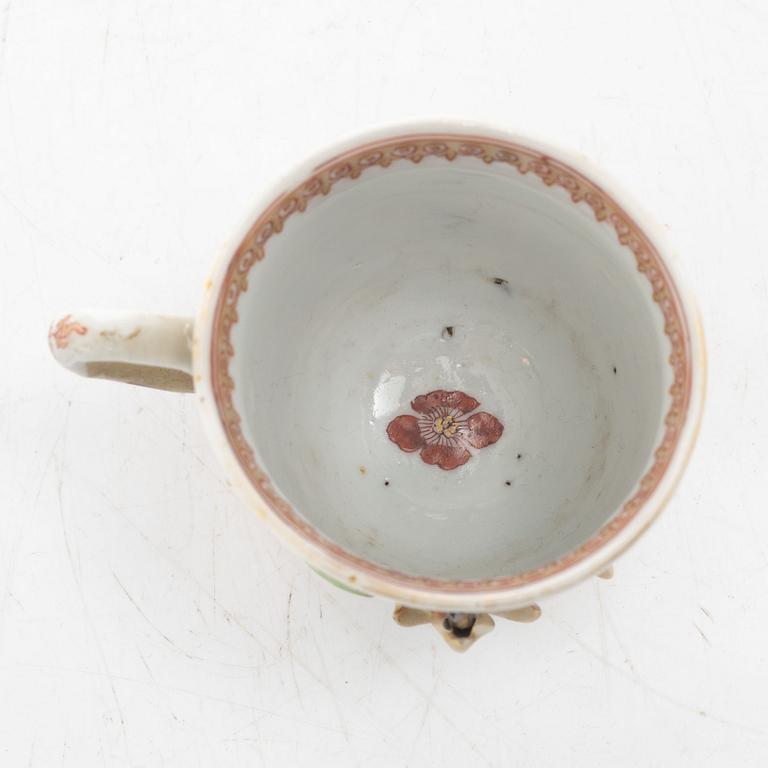 A small Chinese famille rose porcelain tureen with cover and stand, two salt cellars, Qing dynasty, Qianlong (1736-95).