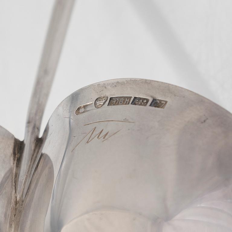 Tapio Wirkkala, a silver bowl and candlestick, Kultakeskus, Hämeenlinna 1956, and Hopeatehdas Helsinki 1952.