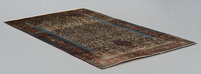 MATTO, an antique silk Kashan, possibly Motachem, ca 208-213,5 x 129,5-132 cm.